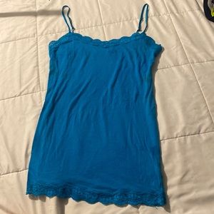 blue y2k cami shirt , sadly the brand is not anywhere on the shirt:(